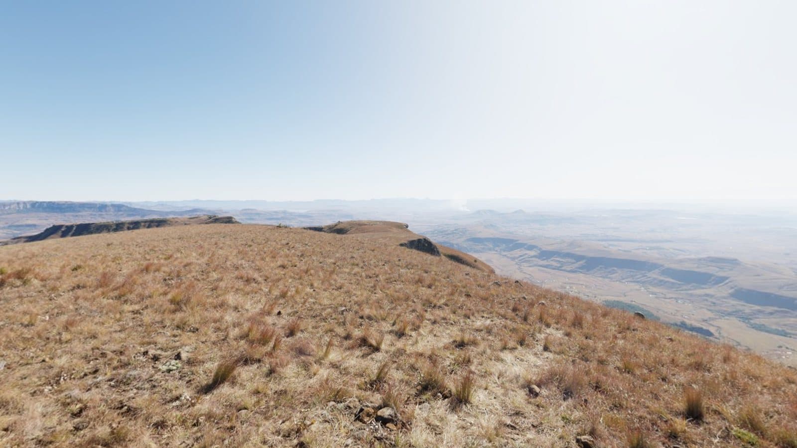 A wide plateau under a clear sky, representing the scope of a 360 panorama