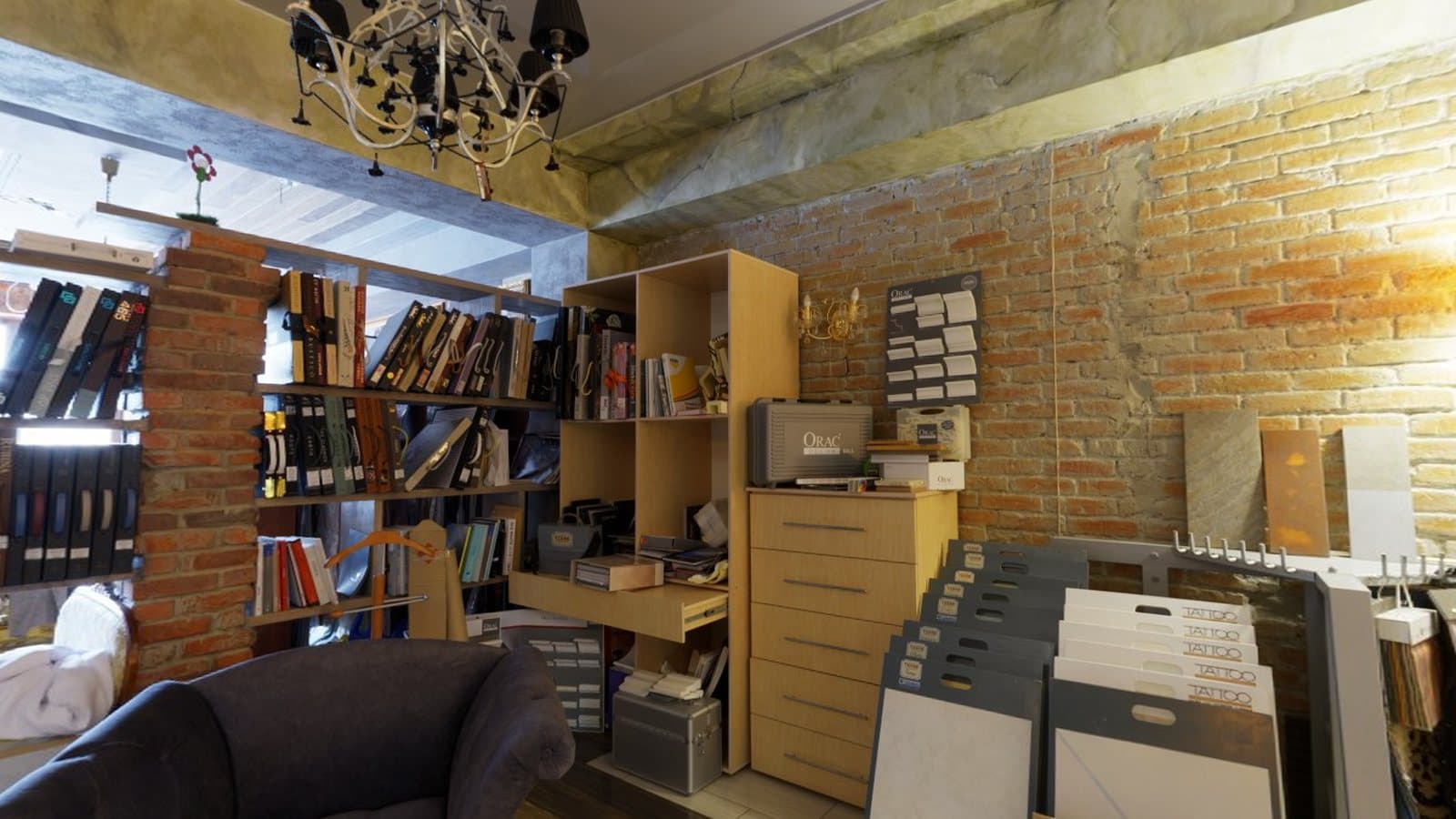 A design showroom with shelves, sofas and sample displays